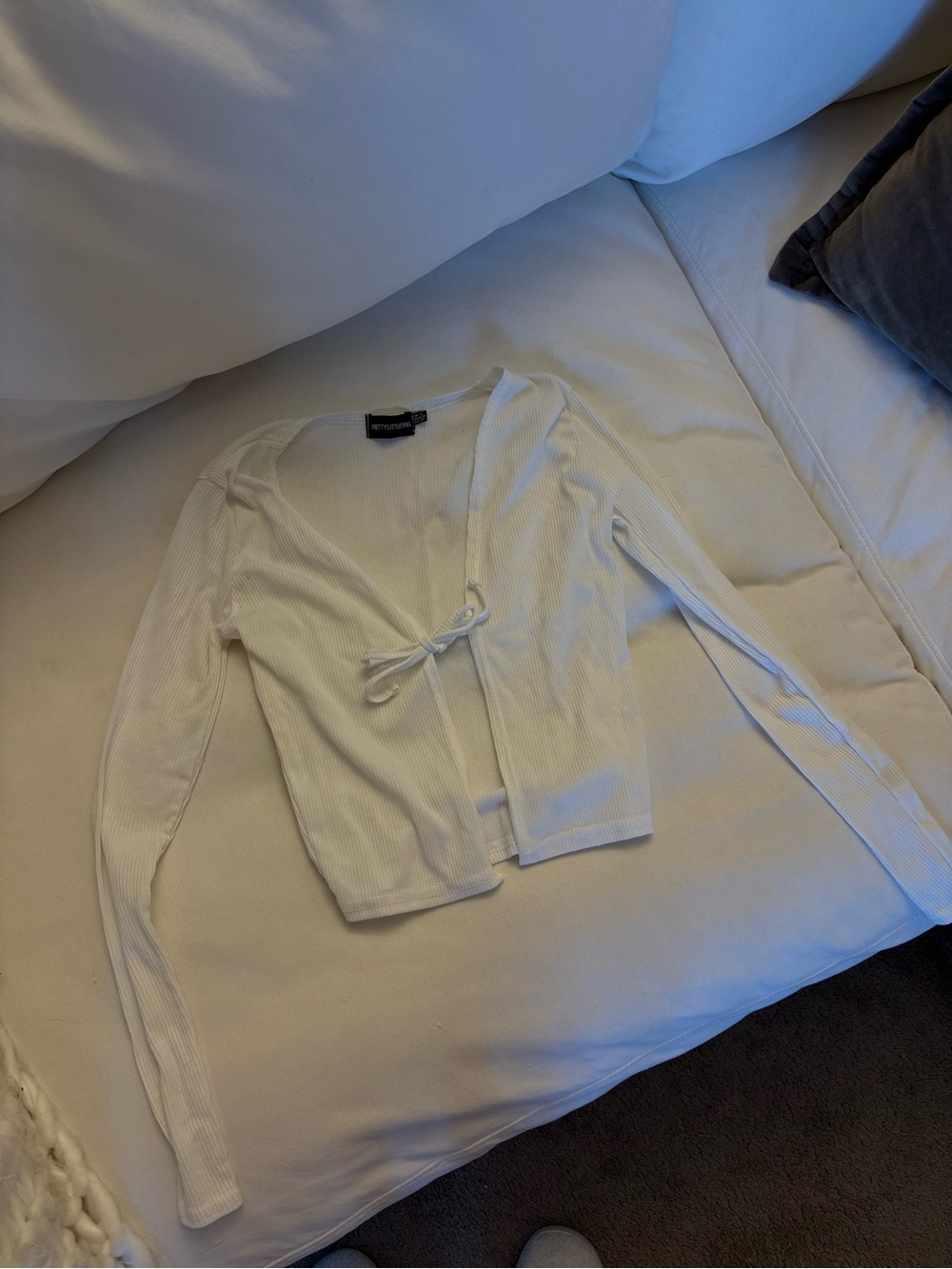 PrettyLittleThing White Ribbed Top with Branded Neck Tag